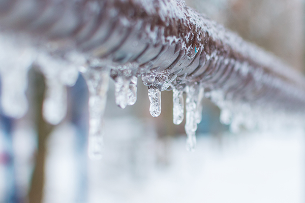 Ice on the side of a house.